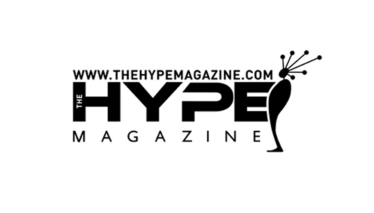 The Hype Magazine logo — a black wordmark reading 'THE HYPE MAGAZINE' with the URL thehypemagazine.com above it and a stylized champagne-glass burst graphic, on a white background.