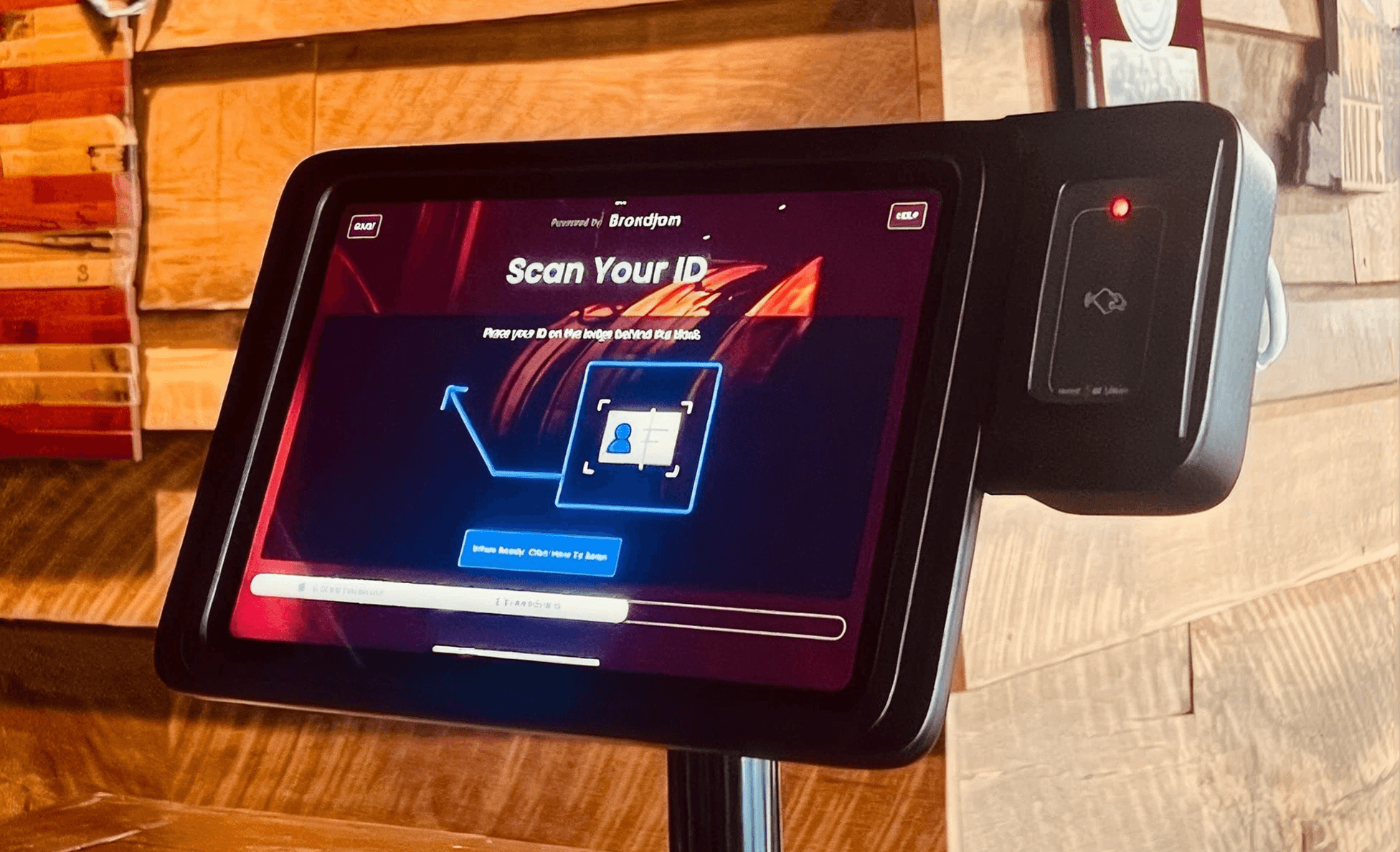 Festival ID-check kiosk prompting a guest to scan their ID