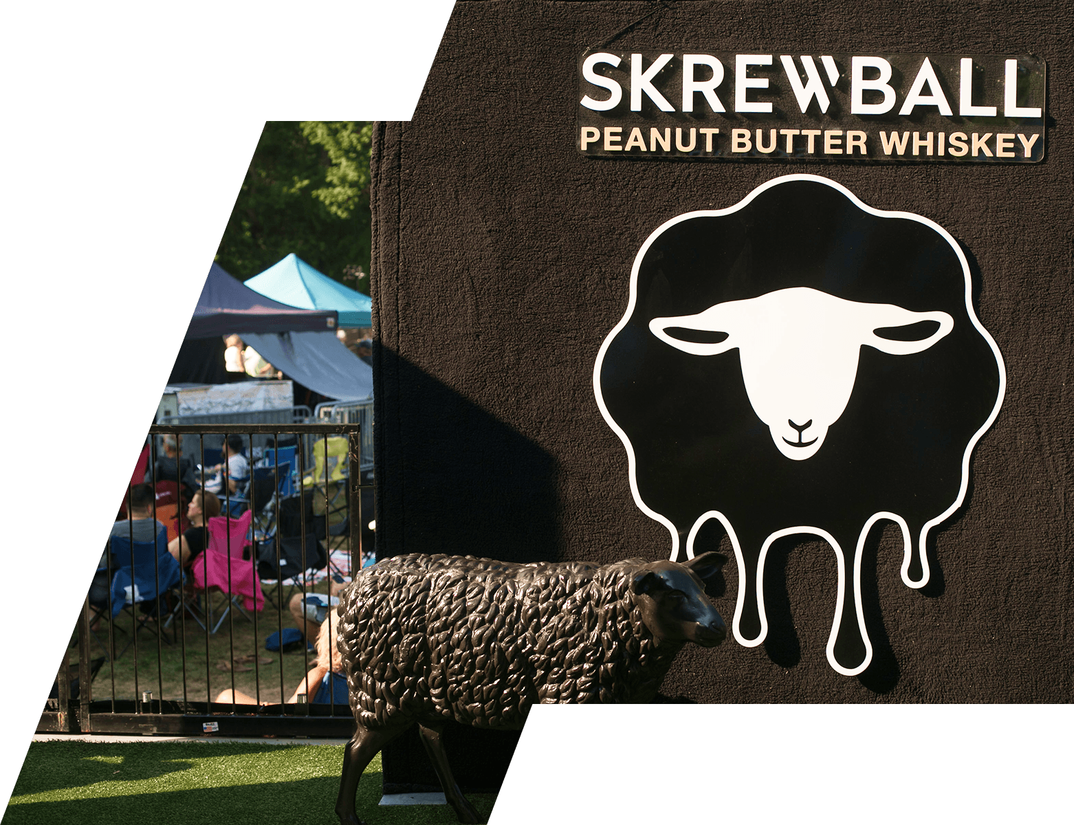 Skrewball Peanut Butter Whiskey festival activation wall with the dripping-sheep logo and a bronze sheep sculpture, festival-goers lounging behind a fence
